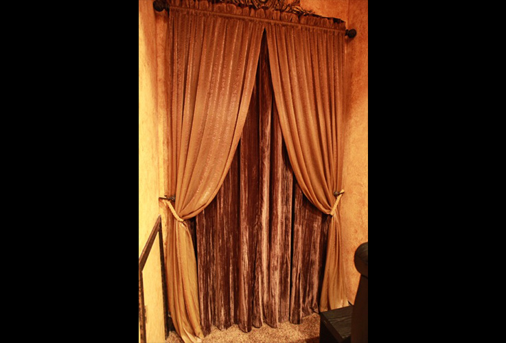 Theatre style drapes over media room entrance