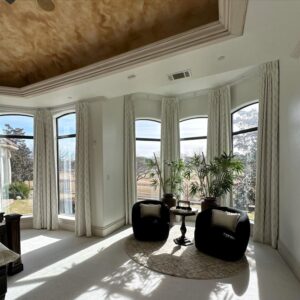 Elegant office setting with custom window treatments